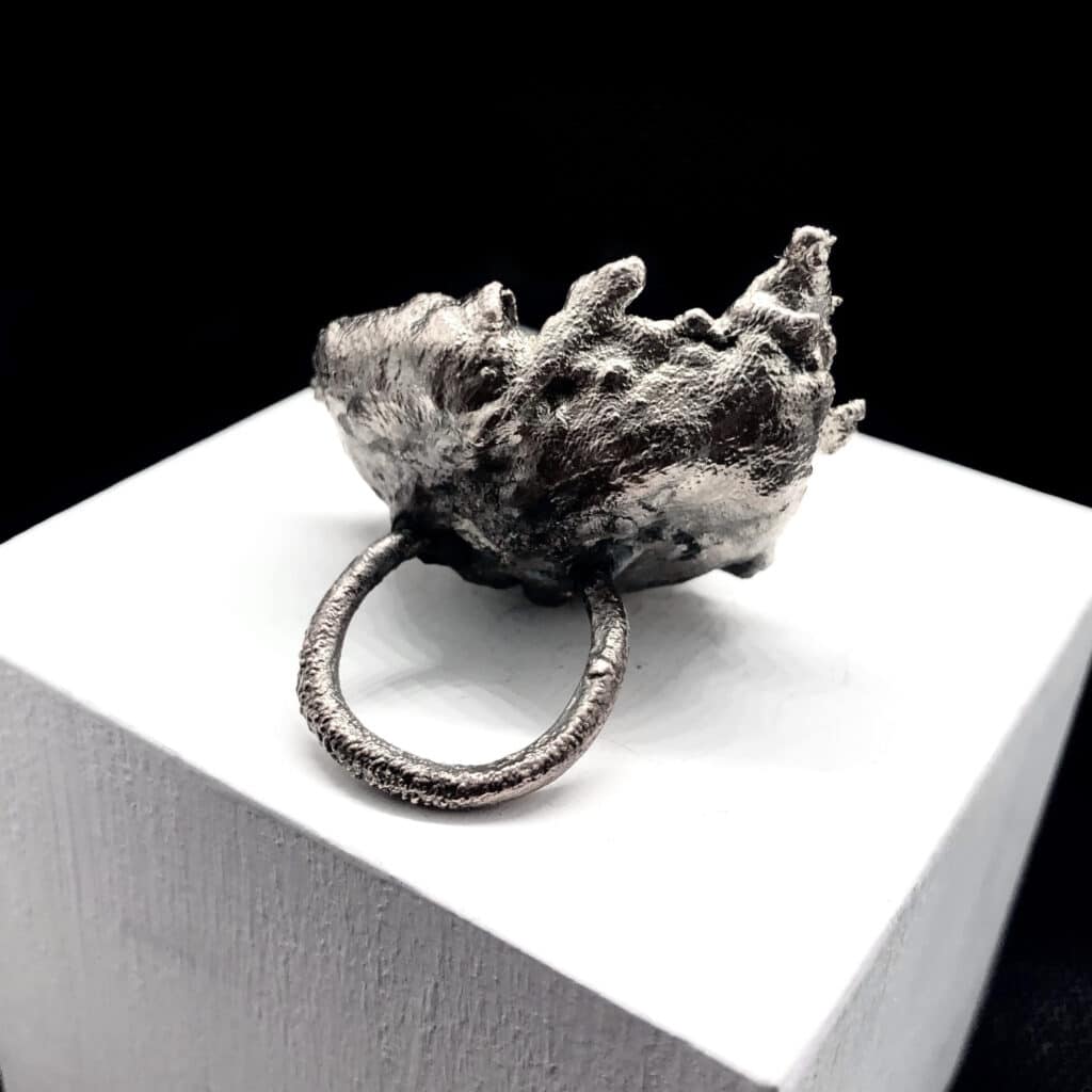 DARK MATTER – waste photographic paper ring plated with silver reclaimed from spent photographic fixer